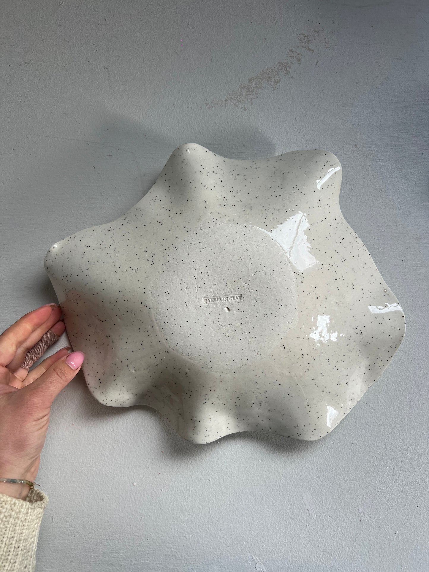 Speckled wavy bowl