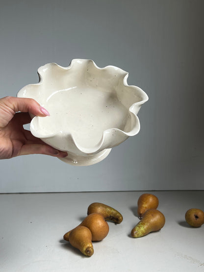 Scalloped bowl on pedestal