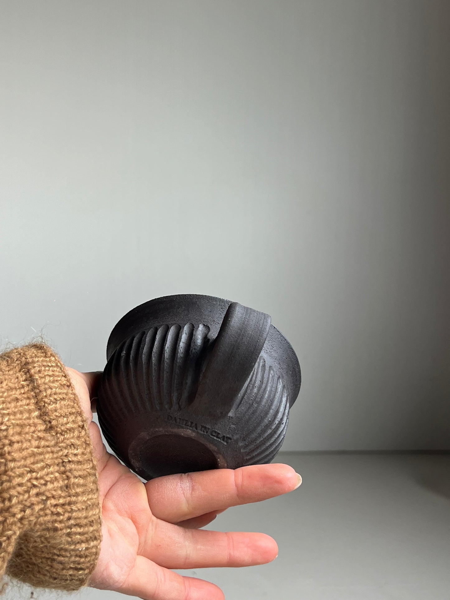 Black Clay fluted cup unglazed outside