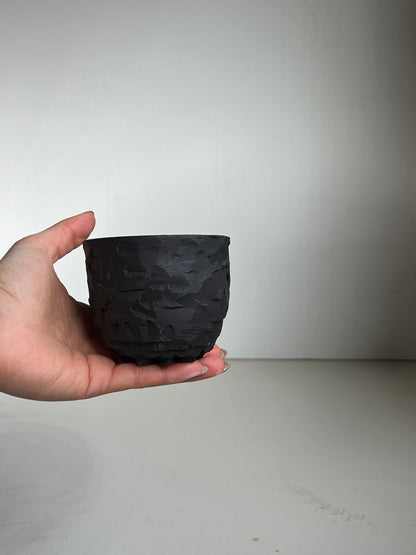 Black Clay large Kurinuki Cup with flower foot.